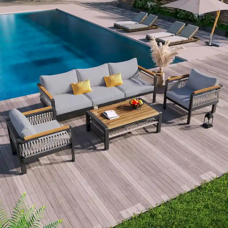 Set da Salotto da Esterno a 4 Pezzi con Cuscini e 1 Tavolino da Caffè