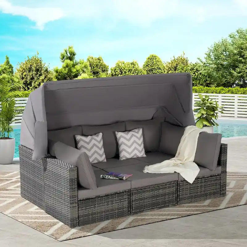 Set di mobili da esterno in vimini a 5 pezzi con daybed e tettoia retrattile, tavolino laterale riponibile e cuscini morbidi