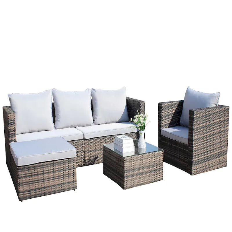 Set divano e tavolino da caffè da esterno in vimini di rattan PE a 4 pezzi con cuscini
