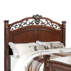 Letto in legno con testiera intagliata in ciliegio scuro