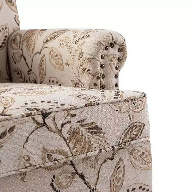 Poltrona in legno imbottita in stile transizionale con motivo floreale, braccioli a pannello e schienale a gobba di cammello