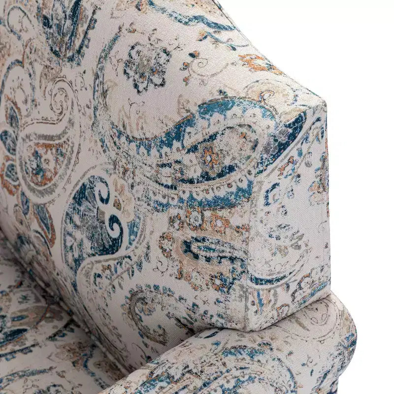 Poltrona in legno imbottita in stile transizionale con motivo floreale, braccioli a pannello e schienale a gobba di cammello