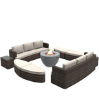 Set da esterno 9 pezzi con divano letto in vimini e tavolo braciere in cemento