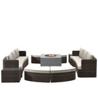Set da esterno 9 pezzi con divano letto in vimini e tavolo braciere in cemento