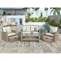 Set di mobili da giardino, salotto da esterno a 4 pezzi in vimini sintetico resistente alle intemperie con pouf e cuscini