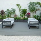 LeisureMod Chelsea Set da 4 Pezzi Sezionale da Esterno con Divanetto Nero in Alluminio con Cuscini