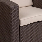 Sedia in finto rattan con cuscino per tutte le stagioni