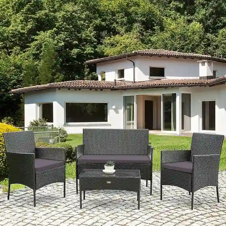 Set divano da esterno in rattan imbottito 4 pezzi con tavolino da caffè in vetro temperato - 24 x 23,5 x 33 (L x P x A)