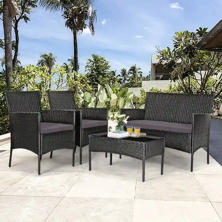 Set divano da esterno in rattan imbottito 4 pezzi con tavolino da caffè in vetro temperato - 24 x 23,5 x 33 (L x P x A)
