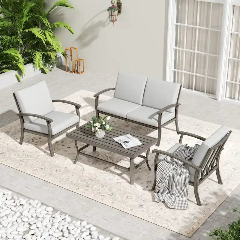 Set da conversazione da patio a 4 posti in alluminio con tavolino da caffè, divanetto e cuscini grigio chiaro