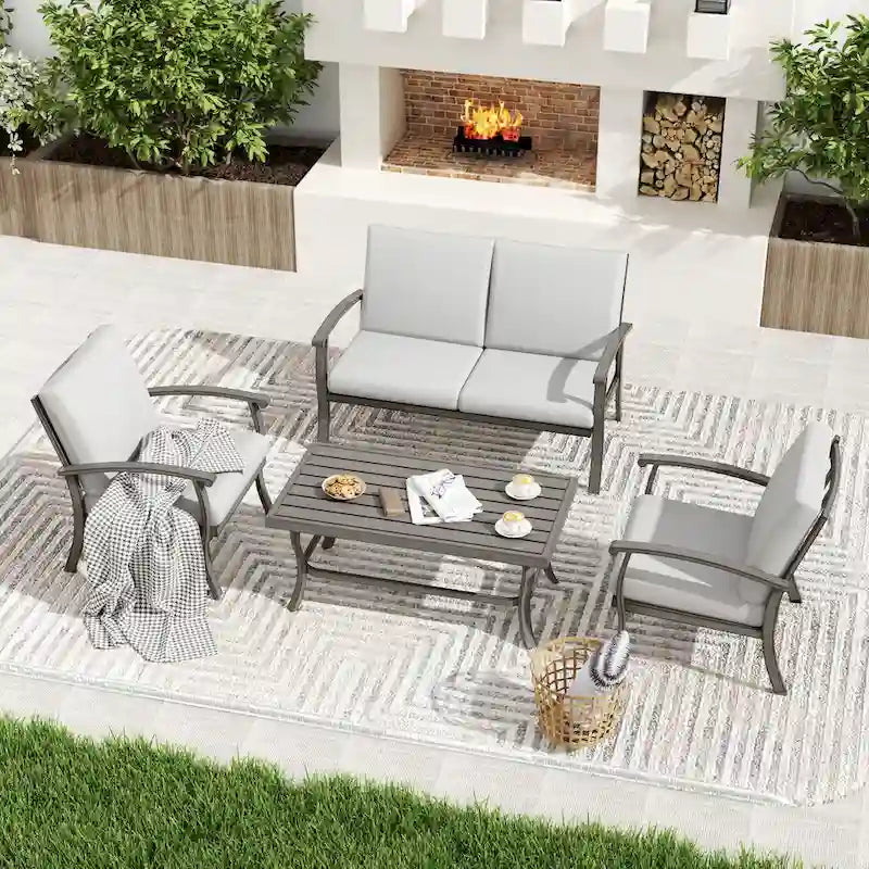 Set da conversazione da patio a 4 posti in alluminio con tavolino da caffè, divanetto e cuscini grigio chiaro